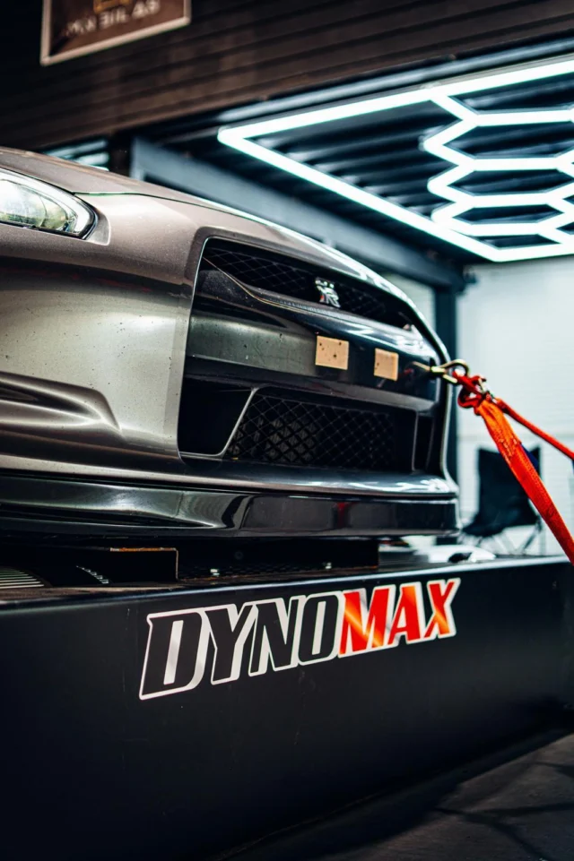 Nissan GT-R secured on the Dynomax dynamometer — front view